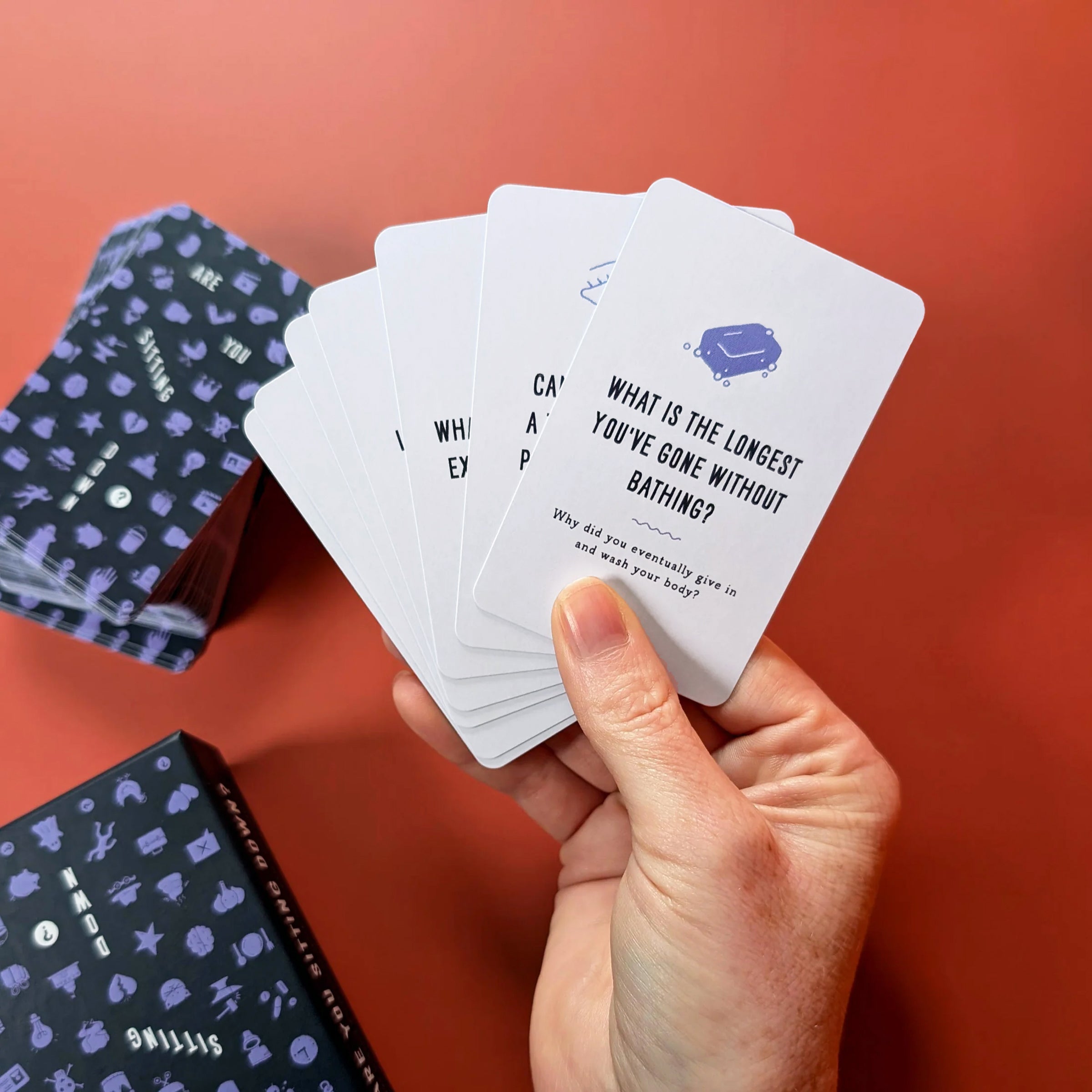 Are You Sitting Down? Game Cards In Hand